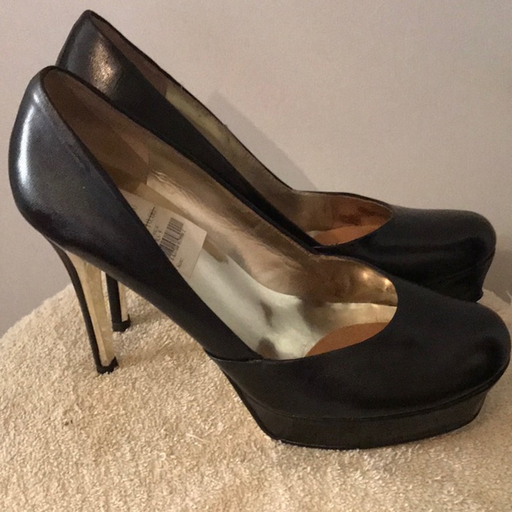 Black leather pumps